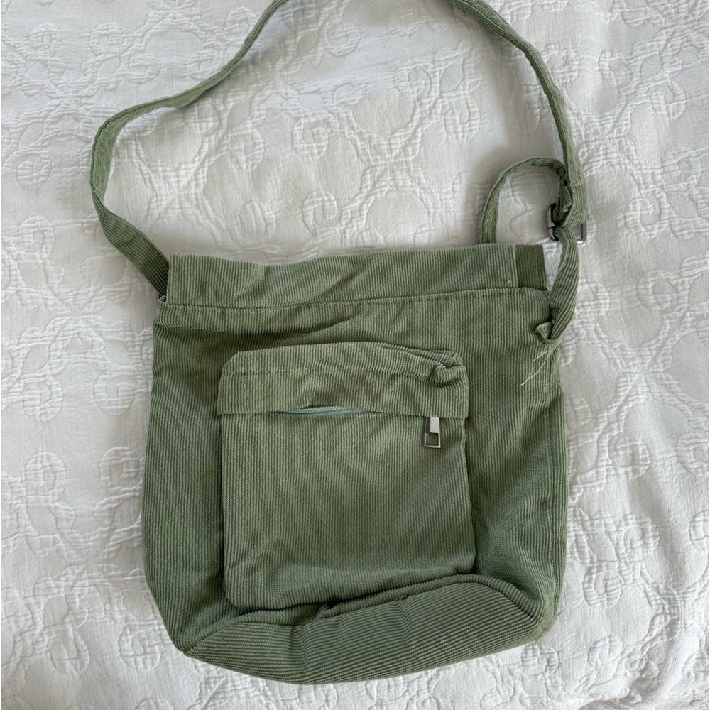 Small green corduroy pocket bag